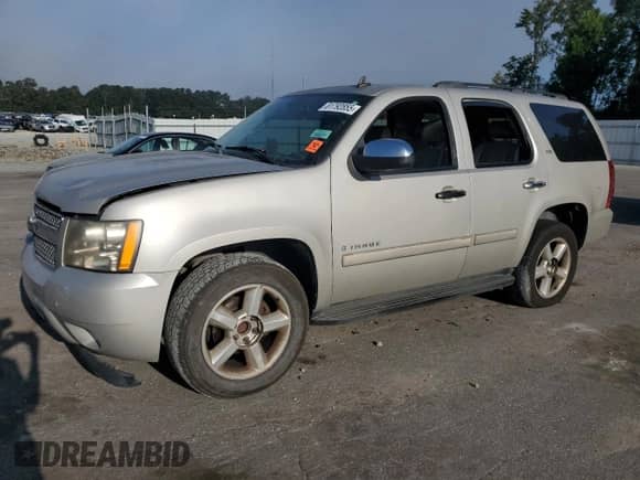 2007 Chevrolet Tahoe LTZ с VIN 1GNFC13057R346917, выставлен на аукционе Copart как лот 81792855 с пробегом 328 436 миль миль и Чистый • Clean title. История ставок и продаж доступна на DreamBid. Изображение 1.