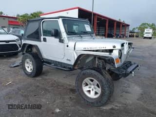 2005 Jeep Wrangler Rubicon with VIN 1J4FA69S05P339624, listed as a IAAI auction lot 42760598 with 105,600 mi miles and . Bid and sale history available at DreamBid. Image 1.