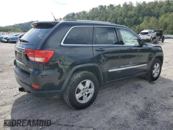 2012 Jeep Grand Cherokee Laredo z VIN 1C4RJFAG2CC209133, wystawiony jako Copart lot #81589965 z przebiegiem 90 232 mil mil oraz Szkoda całkowita • Salvage title. Historia ofert i sprzedaży dostępna na DreamBid. Obrazek 3.