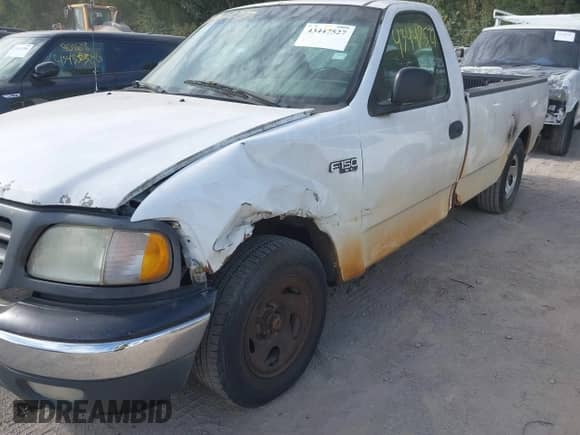 2003 Ford F-150 XL with VIN 1FTRF17223NB47852, listed as a IAAI auction lot 43447527 with Not provided miles and . Bid and sale history available at DreamBid. Image 6.