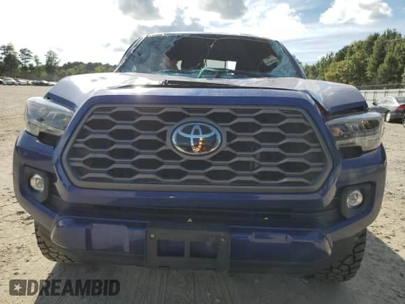 2022 Toyota Tacoma SR5 with VIN 3TYDZ5BN0NT005849, listed as a Copart auction lot 71113125 with 63,449 mi miles and Salvage title. Bid and sale history available at DreamBid. Image 5.
