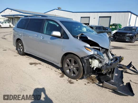 2015 Toyota Sienna SE with VIN 5TDXK3DC0FS567474, listed as a Copart auction lot 80295615 with 93,112 mi miles and Salvage title. Bid and sale history available at DreamBid. Image 4.