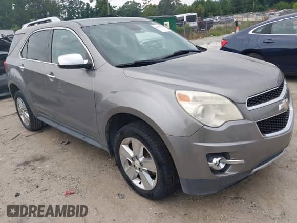2012 Chevrolet Equinox LTZ z VIN 2GNFLFE55C6253133, wystawiony jako IAAI lot #42881042 z przebiegiem 247 642 mil mil oraz . Historia ofert i sprzedaży dostępna na DreamBid. Obrazek 1.