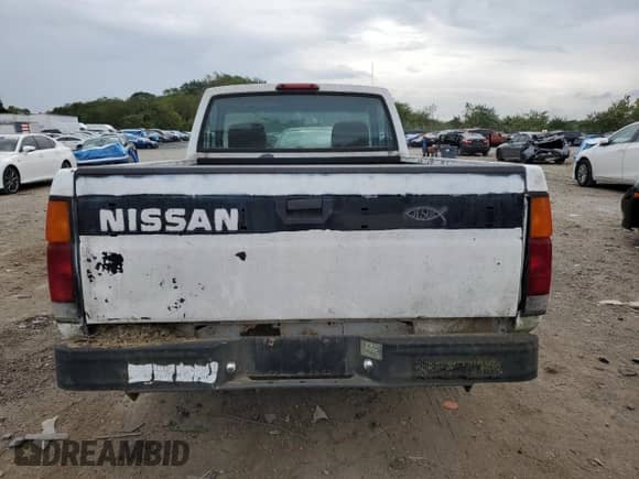 1995 Nissan Frontier z VIN 1N6SD11S2SC462237, wystawiony jako Copart lot #81178665 z przebiegiem 161 959 mil mil oraz Czysty tytuł • Clean title. Historia ofert i sprzedaży dostępna na DreamBid. Obrazek 6.