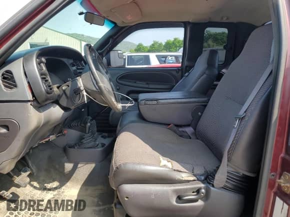 1998 Dodge 3500 z VIN 1B7MF3367WJ214973, wystawiony jako Copart lot #59921755 z przebiegiem 333 761 mil mil oraz Szkoda całkowita • Salvage title. Historia ofert i sprzedaży dostępna na DreamBid. Obrazek 7.