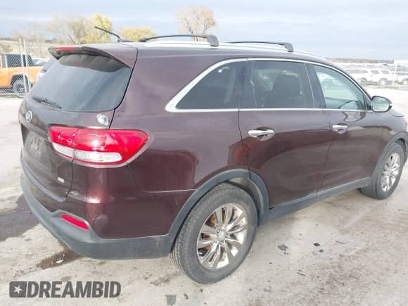 2016 Kia Sorento LX z VIN 5XYPG4A36GG081150, wystawiony jako IAAI lot #43559343 z przebiegiem 178 671 mil mil oraz . Historia ofert i sprzedaży dostępna na DreamBid. Obrazek 4.