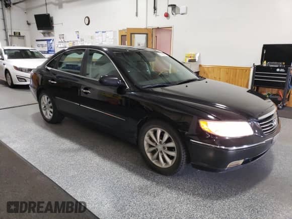 2006 Hyundai Azera SE с VIN KMHFC46F46A056168, выставлен на аукционе Copart как лот 85765045 с пробегом 103 335 миль миль и Чистый • Clean title. История ставок и продаж доступна на DreamBid. Изображение 4.