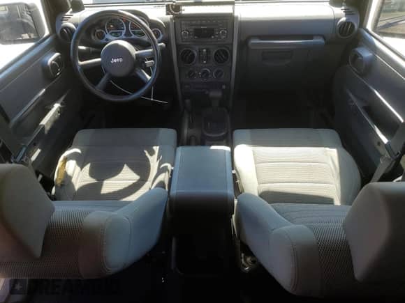 2007 Jeep Wrangler Unlimited Sahara z VIN 1J4GA59127L152918, wystawiony jako Copart lot #85123165 z przebiegiem 180 573 mil mil oraz Szkoda całkowita • Salvage title. Historia ofert i sprzedaży dostępna na DreamBid. Obrazek 8.