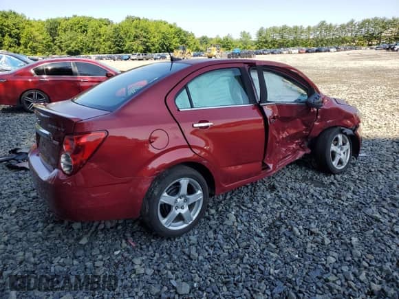2014 Chevrolet Sonic LTZ с VIN 1G1JE5SB5E4232734, выставлен на аукционе Copart как лот 61574285 с пробегом Не указан миль и Списание • Salvage title. История ставок и продаж доступна на DreamBid. Изображение 3.
