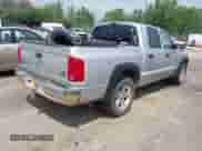 2007 Dodge Dakota Laramie with VIN 1D7HW58P77S270928, listed as a IAAI auction lot 42668463 with 162,468 mi miles and . Bid and sale history available at DreamBid. Image 4.