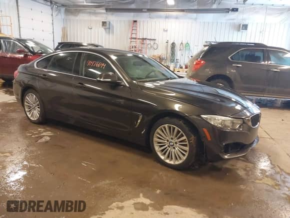 2015 BMW 4 Series 435i xDrive with VIN WBA4B3C54FGV48147, listed as a IAAI auction lot 41310255 with 93,273 mi miles and . Bid and sale history available at DreamBid. Image 1.
