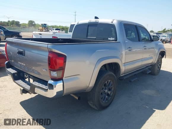 2021 Toyota Tacoma SR5 with VIN 5TFAZ5CN4MX102901, listed as a IAAI auction lot 43136326 with 78,206 mi miles and . Bid and sale history available at DreamBid. Image 4.