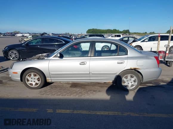 2005 Hyundai Elantra GLS z VIN KMHDN46D75U952932, wystawiony jako IAAI lot #43158187 z przebiegiem 167 076 mil mil oraz . Historia ofert i sprzedaży dostępna na DreamBid. Obrazek 15.