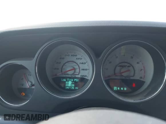 2012 Dodge Challenger SRT-8 392 with VIN 2C3CDYCJ5CH121521, listed as a IAAI auction lot 40747392 with 147,725 mi miles and . Bid and sale history available at DreamBid. Image 7.