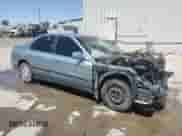 1994 Honda Accord LX z VIN 1HGCD5638RA083668, wystawiony jako Copart lot #58794355 z przebiegiem 180 532 mil mil oraz Szkoda całkowita • Salvage title. Historia ofert i sprzedaży dostępna na DreamBid. Obrazek 4.