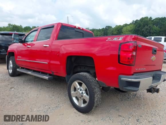 2016 Chevrolet Silverado 2500HD LTZ with VIN 1GC1KWEG0GF161673, listed as a IAAI auction lot 42767825 with 121,313 mi miles and . Bid and sale history available at DreamBid. Image 3.