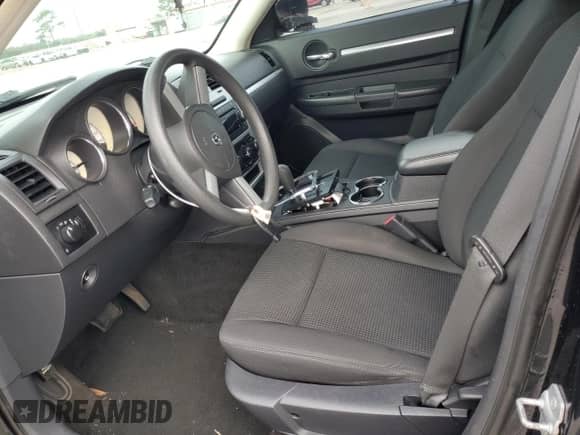 2009 Dodge Charger SE z VIN 2B3KA43D59H534150, wystawiony jako Copart lot #74806424 z przebiegiem 68 564 mil mil oraz Szkoda całkowita • Salvage title. Historia ofert i sprzedaży dostępna na DreamBid. Obrazek 7.