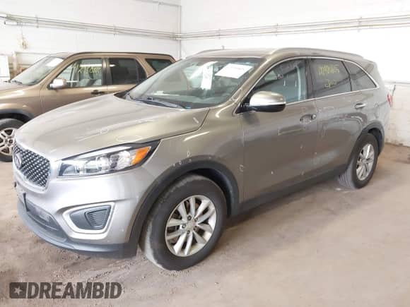 2018 Kia Sorento LX with VIN 5XYPG4A36JG398465, listed as a IAAI auction lot 42920805 with 67,342 mi miles and . Bid and sale history available at DreamBid. Image 2.