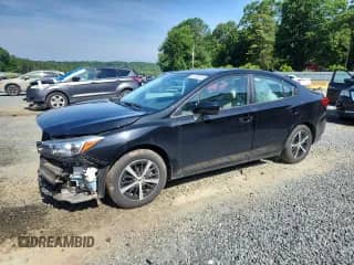 2020 Subaru Impreza Premium with VIN 4S3GKAD6XL3606437, listed as a Copart auction lot 61133015 with 94,710 mi miles and Salvage title. Bid and sale history available at DreamBid. Image 1.
