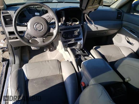 2007 Jeep Grand Cherokee SRT-8 с VIN 1J8HR78347C513091, выставлен на аукционе Copart как лот 49624845 с пробегом Не указан миль и Списание • Salvage title. История ставок и продаж доступна на DreamBid. Изображение 8.