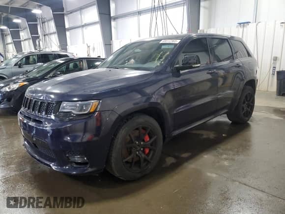 2021 Jeep Grand Cherokee SRT with VIN 1C4RJFDJXMC561210, listed as a Copart auction lot 68512365 with Not provided miles and Salvage title. Bid and sale history available at DreamBid. Image 1.