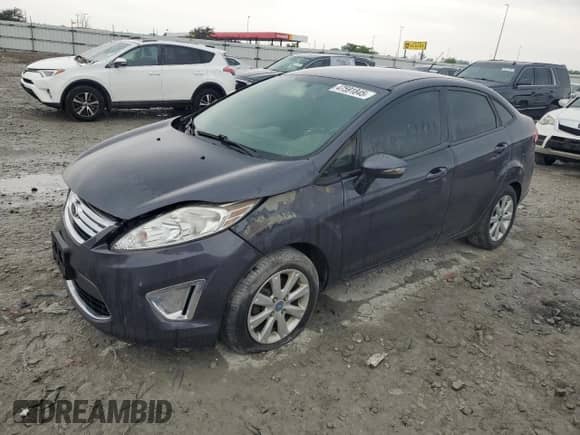2012 Ford Fiesta SEL with VIN 3FADP4CJ1CM219601, listed as a Copart auction lot 47591845 with 153,404 mi miles and Salvage title. Bid and sale history available at DreamBid. Image 1.
