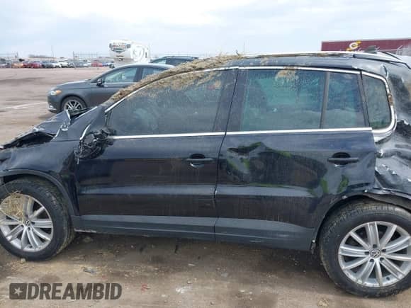 2011 Volkswagen Tiguan S with VIN WVGAV7AX4BW506582, listed as a IAAI auction lot 42080965 with Not provided miles and . Bid and sale history available at DreamBid. Image 15.