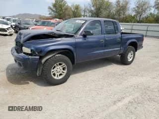 2002 Dodge Dakota Sport with VIN 1B7HG38N52S687497, listed as a Copart auction lot 64076645 with 113,016 mi miles and Salvage title. Bid and sale history available at DreamBid. Image 1.