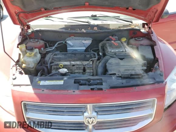 2012 Dodge Caliber SXT с VIN 1C3CDWDA1CD527926, выставлен на аукционе Copart как лот 57713215 с пробегом 156 874 миль миль и Чистый • Clean title. История ставок и продаж доступна на DreamBid. Изображение 11.