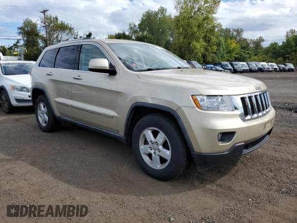 2011 Jeep Grand Cherokee 70th Anniversary with VIN 1J4RR4GGXBC563334, listed as a Copart auction lot 71876355 with 104,989 mi miles and Clean title. Bid and sale history available at DreamBid. Image 4.