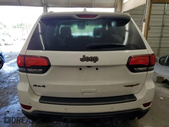 2021 Jeep Grand Cherokee Trailhawk z VIN 1C4RJFLG0MC868410, wystawiony jako Copart lot #63120925 z przebiegiem 140 986 mil mil oraz Czysty tytuł • Clean title. Historia ofert i sprzedaży dostępna na DreamBid. Obrazek 6.