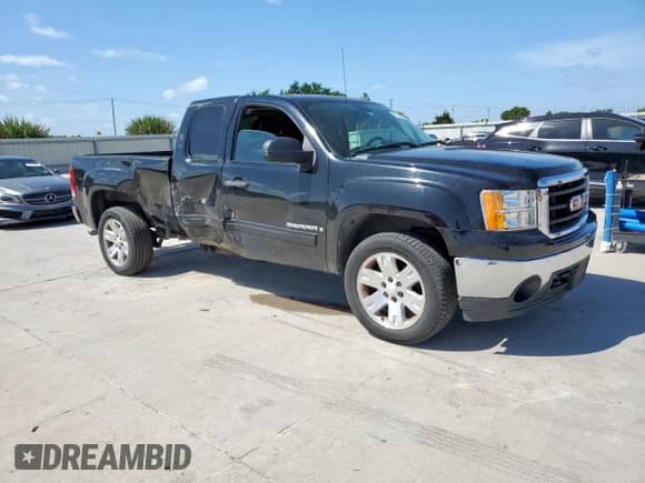 2008 GMC Sierra 1500 Work Truck with VIN 1GTEC19068Z328861, listed as a Copart auction lot 62938965 with 143,071 mi miles and Salvage title. Bid and sale history available at DreamBid. Image 4.