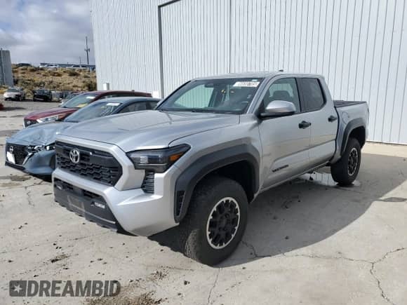 2024 Toyota Tacoma TRD Off Road with VIN 3TMLB5JN6RM029446, listed as a Copart auction lot 86650705 with 27,292 mi miles and Clean title. Bid and sale history available at DreamBid. Image 1.