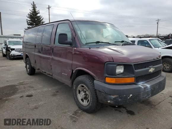 2003 Chevrolet Express Passenger with VIN 1GAHG39U931103320, listed as a Copart auction lot 85278854 with 264,444 mi miles and Salvage title. Bid and sale history available at DreamBid. Image 4.