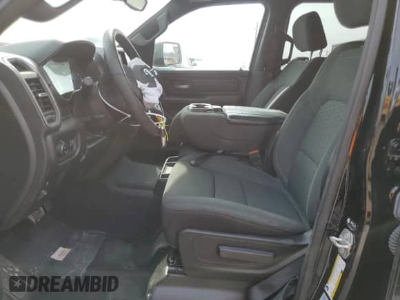 2025 Ram 1500 Tradesman with VIN 1C6RREGG9SN569830, listed as a Copart auction lot 46876395 with 10,969 mi miles and Clean title. Bid and sale history available at DreamBid. Image 7.