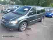 2002 Dodge Caravan ES with VIN 2B4GP54L02R581050, listed as a IAAI auction lot 42812183 with 208,964 mi miles and . Bid and sale history available at DreamBid. Image 2.