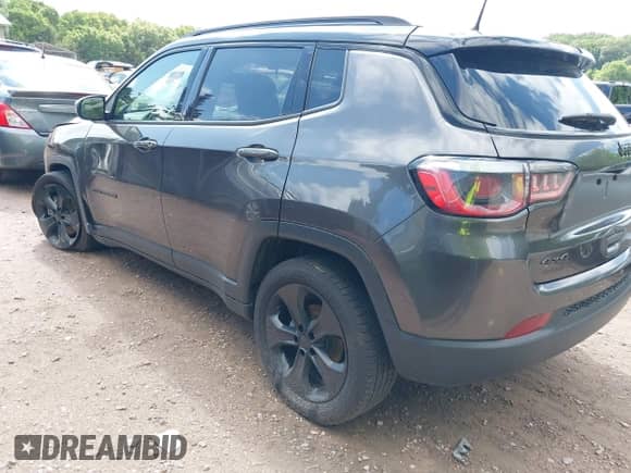 2019 Jeep Compass Latitude with VIN 3C4NJDBB3KT638113, listed as a IAAI auction lot 42510167 with 69,034 mi miles and . Bid and sale history available at DreamBid. Image 3.