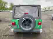 2004 Jeep Wrangler Sport z VIN 1J4FA49S04P752002, wystawiony jako Copart lot #71279105 z przebiegiem 260 290 mil mil oraz Czysty tytuł • Clean title. Historia ofert i sprzedaży dostępna na DreamBid. Obrazek 6.