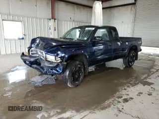 2004 Dodge Dakota with VIN 1D7HG32K44S657608, listed as a Copart auction lot 70653495 with 105,144 mi miles and Salvage title. Bid and sale history available at DreamBid. Image 1.