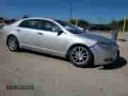 2012 Chevrolet Malibu LTZ 1LZ with VIN 1G1ZE5E0XCF254615, listed as a Copart auction lot 71444435 with 149,160 mi miles and Salvage title. Bid and sale history available at DreamBid. Image 4.