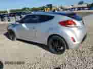 2013 Hyundai Veloster w/Black Int z VIN KMHTC6AD9DU136551, wystawiony jako Copart lot #83799205 z przebiegiem 101 623 mil mil oraz Szkoda całkowita • Salvage title. Historia ofert i sprzedaży dostępna na DreamBid. Obrazek 2.