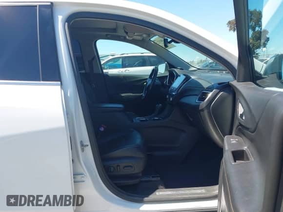 2020 Chevrolet Equinox Premier with VIN 2GNAXNEV2L6140216, listed as a IAAI auction lot 43035322 with 103,313 mi miles and . Bid and sale history available at DreamBid. Image 5.