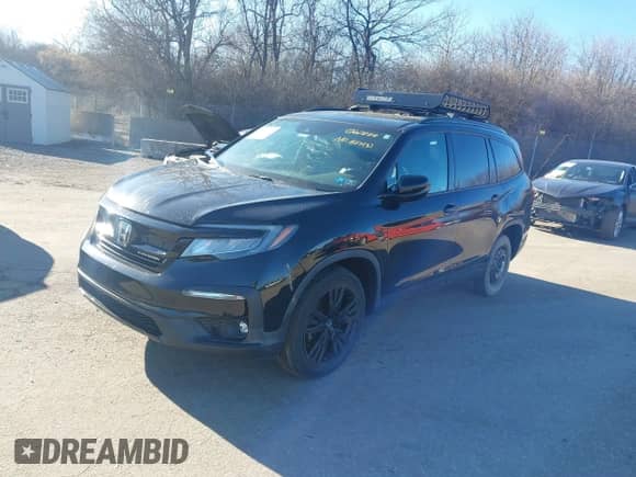 2020 Honda Pilot Black Edition z VIN 5FNYF6H79LB060838, wystawiony jako IAAI lot #41804158 z przebiegiem Nie podano mil oraz . Historia ofert i sprzedaży dostępna na DreamBid. Obrazek 2.