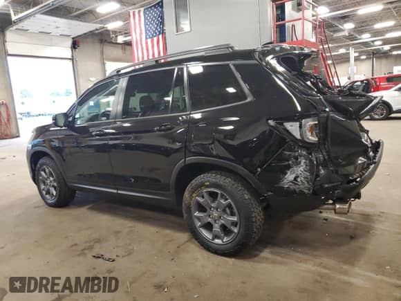 2024 Honda Passport TrailSport z VIN 5FNYF8H67RB019197, wystawiony jako Copart lot #67818765 z przebiegiem 10 425 mil mil oraz Szkoda całkowita • Salvage title. Historia ofert i sprzedaży dostępna na DreamBid. Obrazek 2.