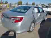 2012 Toyota Camry XLE with VIN 4T1BD1FK9CU061030, listed as a IAAI auction lot 43023180 with 180,335 mi miles and . Bid and sale history available at DreamBid. Image 4.