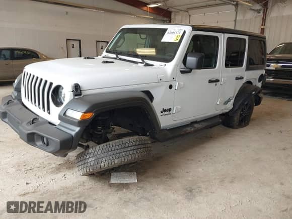 2021 Jeep Wrangler Unlimited Sport S with VIN 1C4HJXDG1MW521893, listed as a IAAI auction lot 42601371 with 40,694 mi miles and . Bid and sale history available at DreamBid. Image 2.