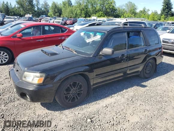 2004 Subaru Forester XT with VIN JF1SG69654H724553, listed as a Copart auction lot 63303605 with 238,806 mi miles and Salvage title. Bid and sale history available at DreamBid. Image 1.