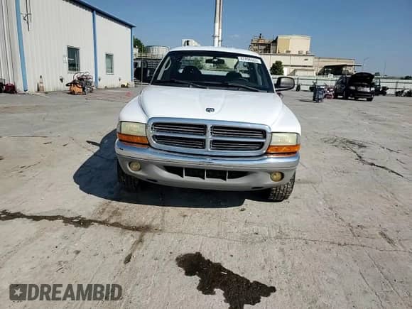 2001 Dodge Dakota Sport с VIN 1B7HL2AX81S343985, выставлен на аукционе Copart как лот 82498565 с пробегом 247 286 миль миль и Списание • Salvage title. История ставок и продаж доступна на DreamBid. Изображение 14.