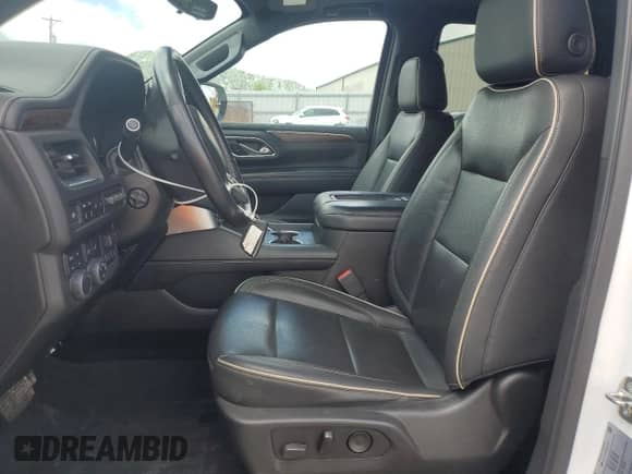 2021 Chevrolet Tahoe Premier with VIN 1GNSKSKD3MR262148, listed as a Copart auction lot 59203575 with 131,067 mi miles and Salvage title. Bid and sale history available at DreamBid. Image 7.