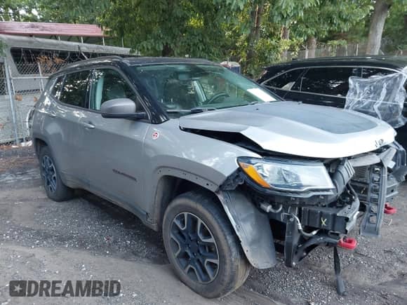 2019 Jeep Compass Trailhawk z VIN 3C4NJDDB2KT722047, wystawiony jako IAAI lot #42800200 z przebiegiem 140 000 mil mil oraz . Historia ofert i sprzedaży dostępna na DreamBid. Obrazek 1.
